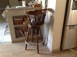 2 bar stools with backs and they swivel