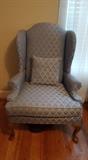 One of two wing back chairs