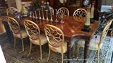 Formal dining table and 8 chairs (sold separately) 