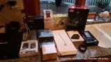 Assorted brand new electronics inlcude Wireless Beats by Dre headphones, Iphone 6 accessories, charging pads, 