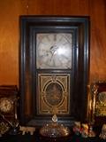 antique clock with metal dial