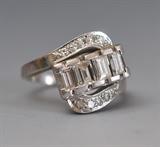 Lot 157: Platinum Diamond Ladies Ring, set with emerald cut and round diamonds
ring size 6 3/4, BID ON-LINE: www.fairfieldauction.com