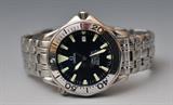 Lot 296: Omega Sea Master Professional Wrist Watch, stainless steel, large size with dark blue enameled face, and date window, 45 mm diameter of face  BID ON-LINE: www.fairfieldauction.com