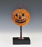 Lot 1: Parade Jack-O-Lantern, with painted face and candle holder inside, 14" high as configured
stamped with patent date July 7, 1930,  BID ON-LINE: www.fairfieldauction.com