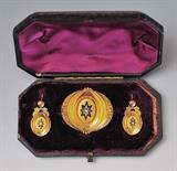 Lot 80:  Victorian 15k Gold Brooch and Earring Set
with seed pearls and blue enameling
2 5/8" diameter brooch, 8.2 dwt gross, in a period fitted box