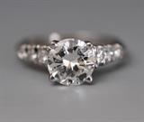 Lot 86: Platinum Diamond Solitaire Ring
with approximately 1.7 ct center stone, SI1, I/J color
ring size 6 together with two 14k diamond 
eternity bands, ring sizes 5 1/2 and 4 3/4