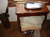 Turn top table, Wedgwood blue and white platter, umbrella stand, old blankets and pillows...