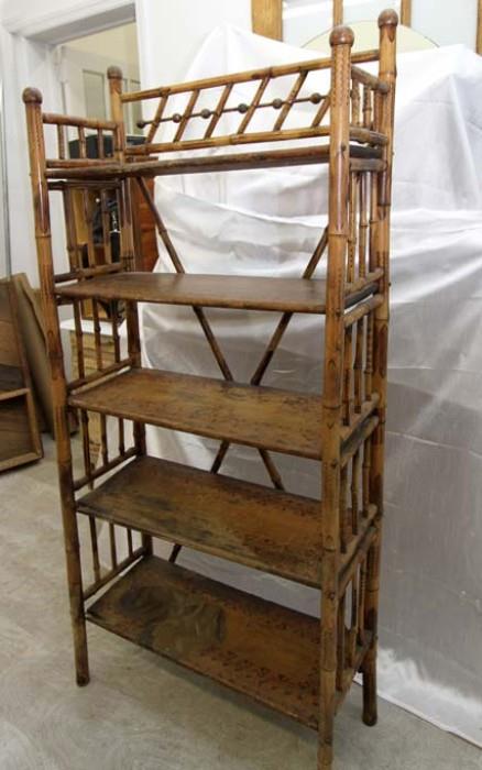 Antique bamboo bookcase. We have 2...both need work.