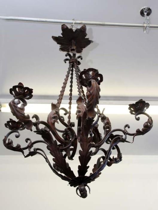 Heavy duty reproduction iron chandelier. Not wired.