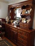 Link Taylor Colonial Pine dresser with lighted mirror hutch. This has 11 drawers on the bottom plus 3 more behind the double doors. 4 more in the hutch!