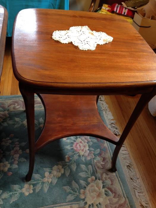 One of several antique easy tables
