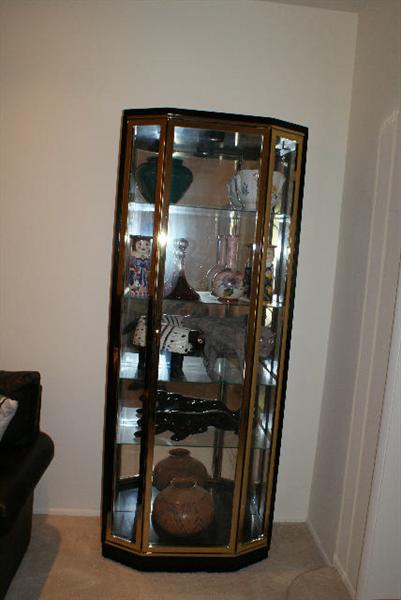 BLACK GLOSS AND BRASS CHINA CABINET, MEASURES 76.5H X 16D X 32W