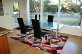COPENHAGEN GLASS TOP DINING TABLE WITH LEAF AND 4 CHAIRS