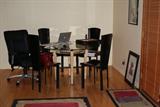 ROUND GLASS TOP DINING/BREAKFAST TABLE, 48" DIAMETER, 4 BLACK LEATHER CHAIRS. COPENHAGEN