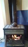 Wood Burning Fireplace 8" Flu,has hot plate on top and door that closes