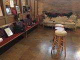 Some of several stools and  beautiful victorian couch