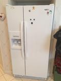 Whirlpool side by side white refrigerator