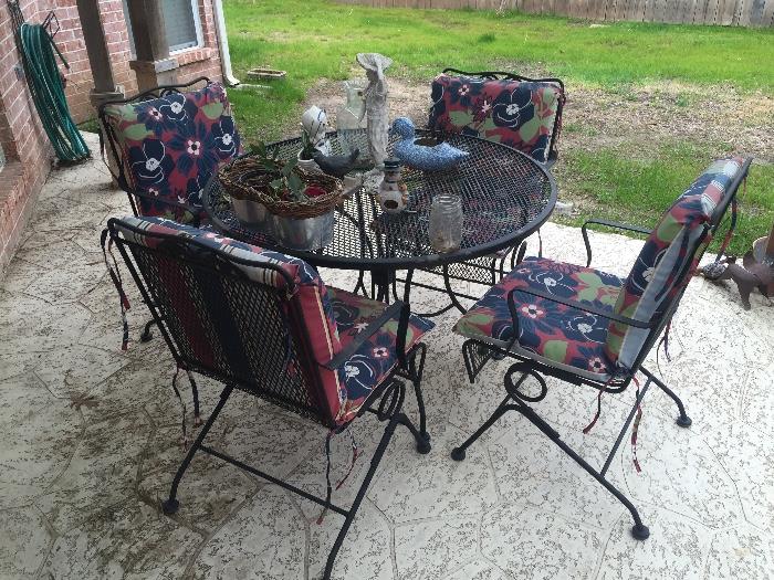 Wrought iron patio set with cushions