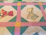 Vintage handmade Sunbonnet quilt