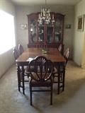 maple dining room set and china cabinet, table and chairs for 8