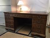 Mahogany desk with brass drawer pulls
