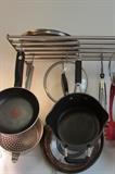 Pots pans and a rack