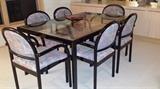 Contemporary dining room table and chairs; Loewenstein 