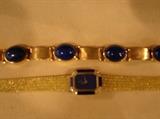 Lapiz and gold watch and bracelet