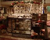 View of cut glass and silver teapots and sugar bowls