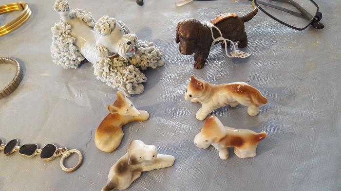 Vintage dog figurines. The one in the upper-right is metal, a souvenir of Salt Lake City. The one in upper-left is dated (possibly by owner) 1957.
