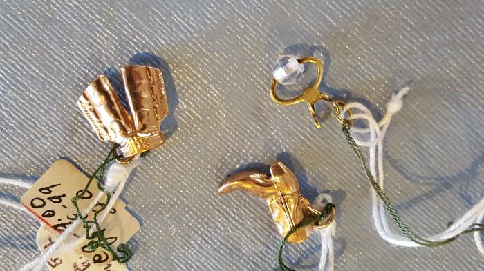 Three 10K charms with original Chicago department store tags.