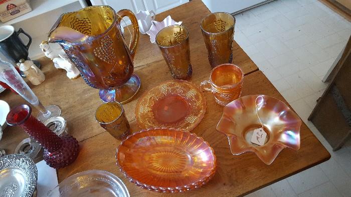 We have several pieces of carnival glass.