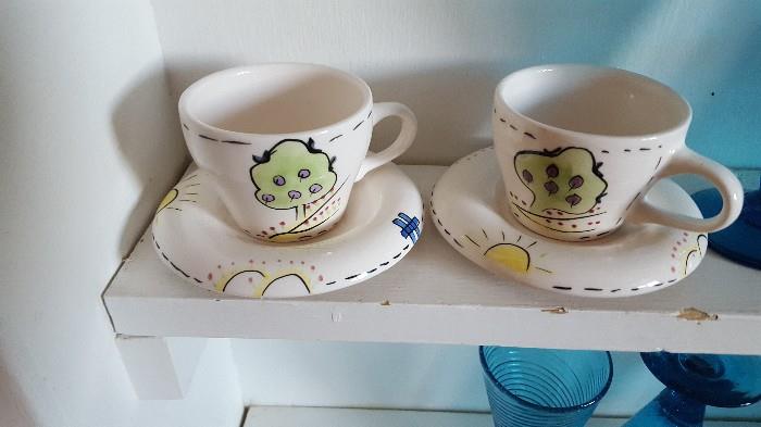 Whimsical 70s cup/saucer pairs.