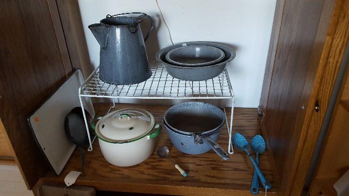 More of the graniteware. Tray on the left is very heavy; spoons on right hard to find. The small skillet is aluminum.