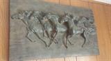 Horse relief sculpture