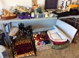 Garage - cute dog bed with pillow, dog toys, dog statue in bed, miscellaneous other dog items