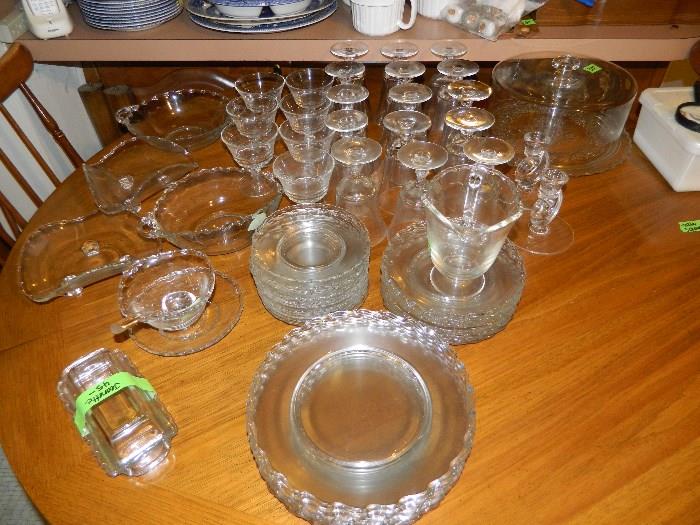Vintage Jeanette Glass including plates, salad plates, butter dish, tricorner bowls (2), Oval bowl, round bowl, smaller bowl, candlesticks, pitcher, small bowl with underplate, glasses