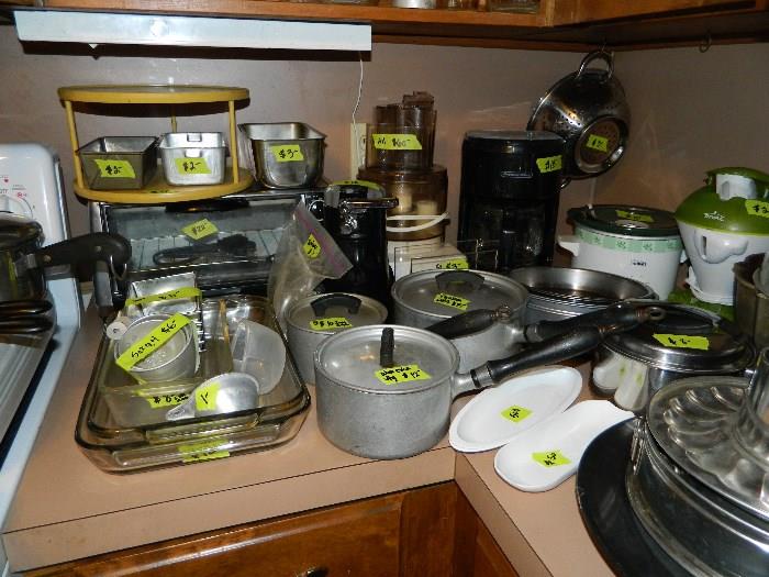 Miscelleanous kitchen - vintage pots, strainer, can opener, coffee maker, crock pot, juicer, etc.