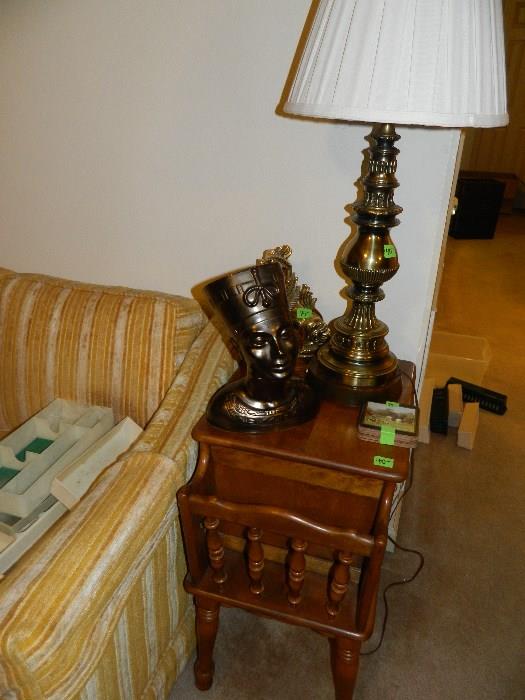 Bookcase end table, lamp, metal figurehead