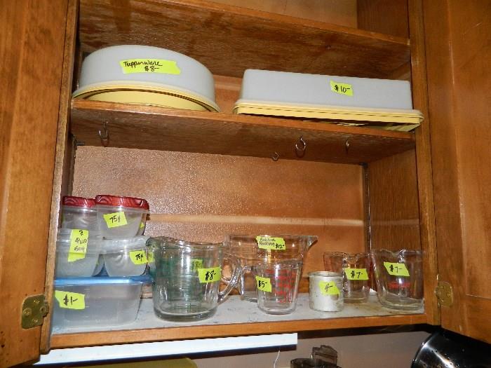 Tupperware, measuring cups, miscellaneous plastic storage