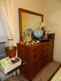 Dresser with mirror, tray/desk table for using with a chair, globe, various miscellaneous items