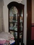 Wonderful lighted curio cabinet, full of angel figures and memorbillia 