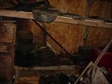 Many old mower tires, parts, and supplies
