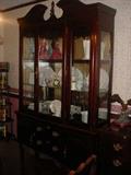 Large china cabinet to match the dining table...lighted top, and this cabinet is full of two sets of fine china, table linens, and more
