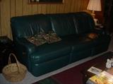 Large blue leather recliner sofa..recliner on each end