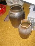 Two vintage Southern pottery crocks...both have some damage as you can see