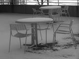 Landscapeform solid steel outdoor resin coated tables and chairs.