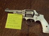 Smith & Wesson 32 Calibre Pearl Handled Chrome Revolver. Patent date 12/29/1914. Serial # 355065. 6th Change to the weapon