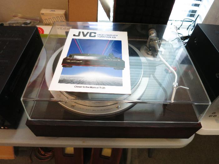 1980s JVC QL-A75 Turn Table With Ortophone Cartridge, Last Serviced In 1999.  I need to retake this picture.  There is a nice size scratch on the cover of this JVC. 