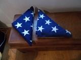 USA Flags that were atop a U. S. veteran's casket - don't know how many stars on each - we haven't unfolded them - will be sold separately...